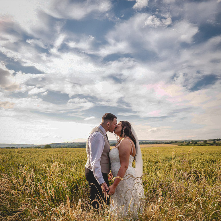 Bride and groom portrait in the cornfield at Runa Farm, wedding photography by Tees Valley Weddings