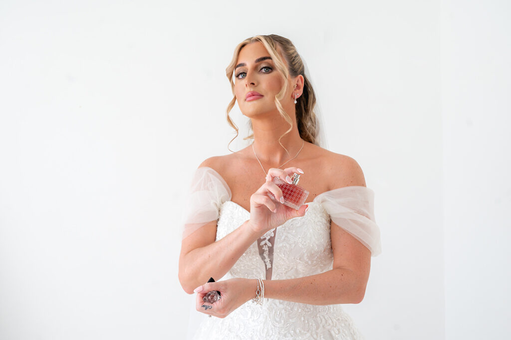 1. Bridal prep on the wedding morning at Hackness Grange is always filled with the most elegant moments. One of our favourites is the quiet pause as the bride sprays her perfume before the ceremony, a simple detail that captures the anticipation and emotion of the day. Hackness Grange offers the perfect light and atmosphere for these natural, timeless photographs that tell the story of the morning beautifully.